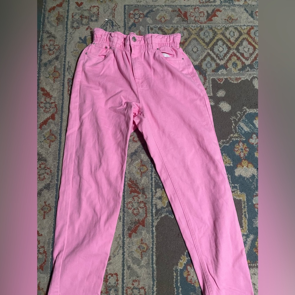 Pink jeans from charlottes russe. Have not been worn once. Size Medium